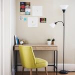 table, chair, desk, lamp, room, carpet, posters, picture stickers, chair, chair, desk, desk, desk, lamp, room, room, room, room, room